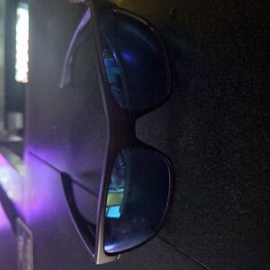 Stylish Black Sunglasses with Blue Lenses